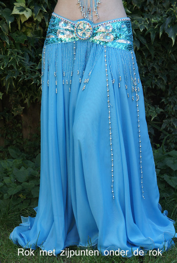 Beautiful skirt in turquoise with strips and slits on the sides and 2 layers of fabric.