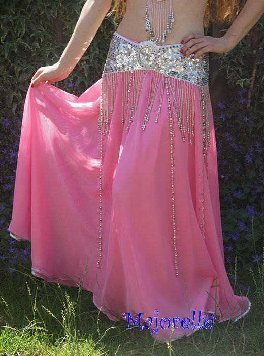 Belly dance skirt light pink with slit, finished with silver beads.