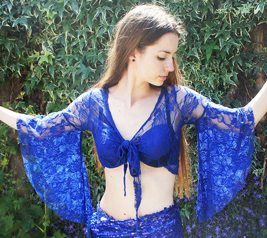 Top is made entirely of lace. Color cornflower blue