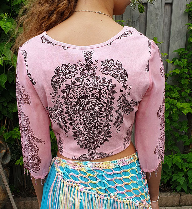 Shirt with peacock print and transparent sleeve in pink