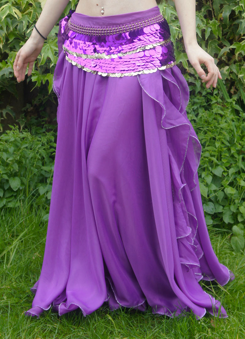 Beautiful purple skirt with strips on the side. With slits on the sides 2 layers of fabric.