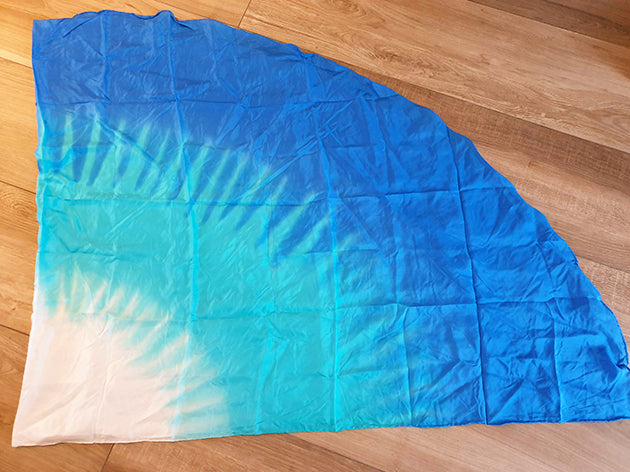Silk veil half round tie dye with the colors; white turquoise blue